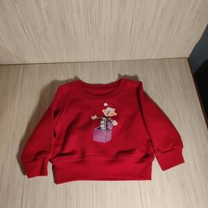 Rudolph The Red Nose Reindeer Sweatshirt with Toy Graphic